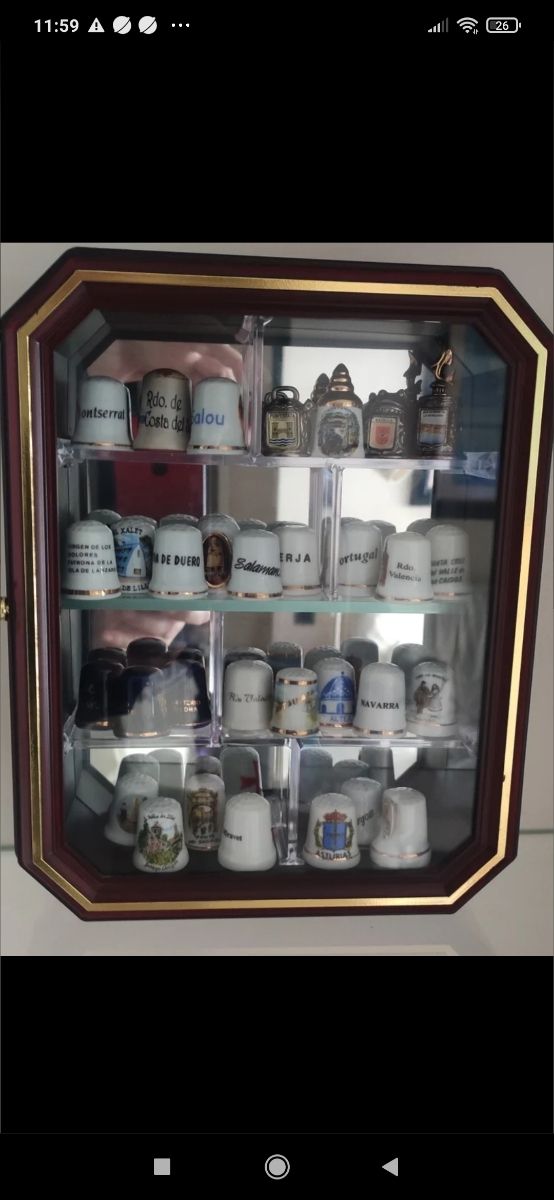 Vitrina con sus dedales