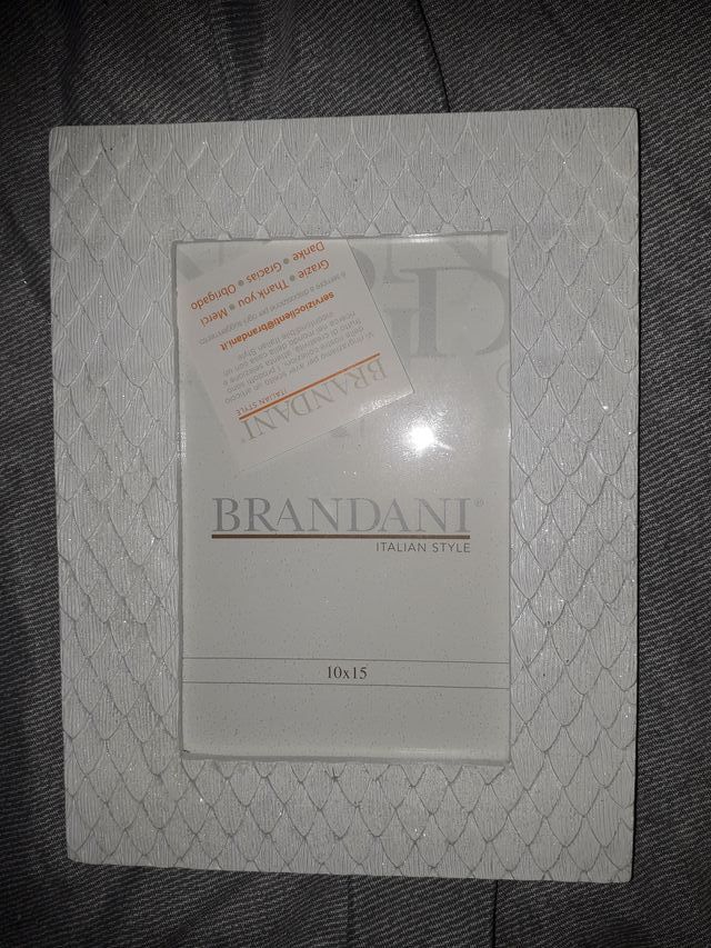 Porta foto petalo marca brandani bianco 10×15 cm.