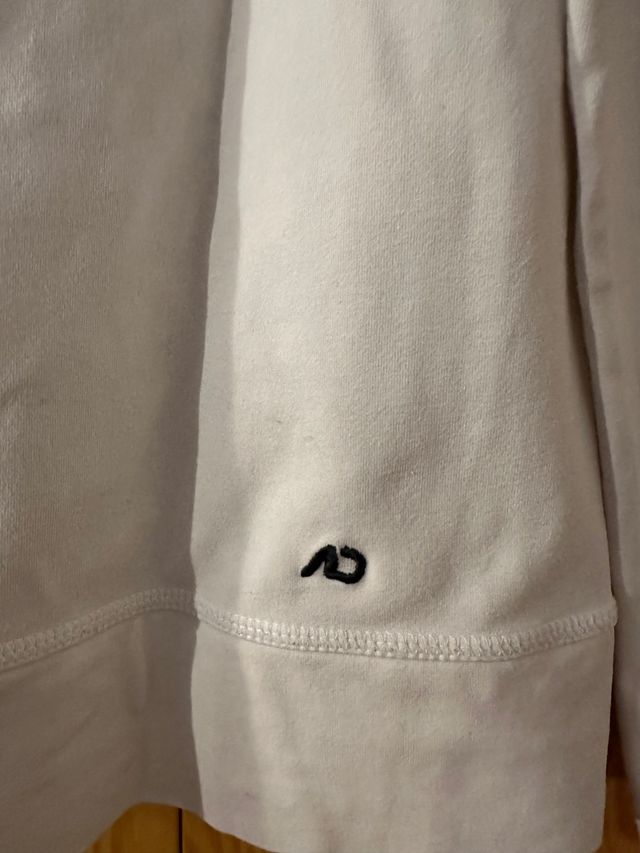 Chaqueta de Nike en balnco y gris