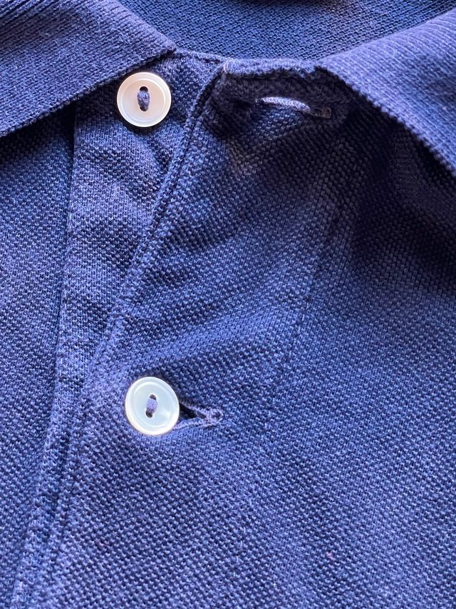 Polo Lacoste azul marino. Talla 12-14 años