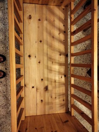 Cuna mecedora de madera