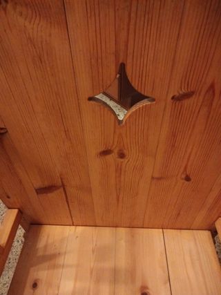 Cuna mecedora de madera