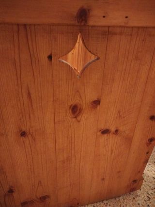 Cuna mecedora de madera