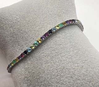 Pulsera riviere de oro de 18 kt con esmeraldas... 