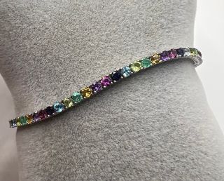 Pulsera riviere de oro de 18 kt con esmeraldas... 