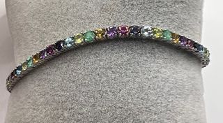 Pulsera riviere de oro de 18 kt con esmeraldas... 