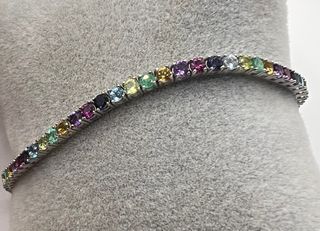 Pulsera riviere de oro de 18 kt con esmeraldas... 
