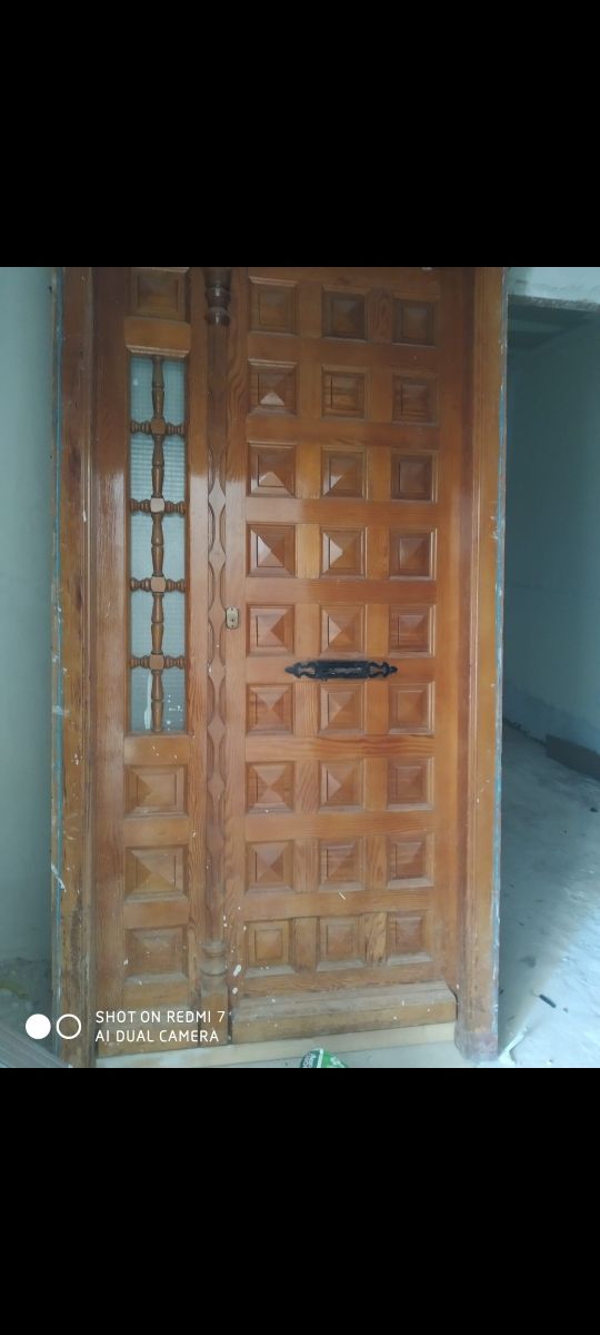 Puerta de calle Madera