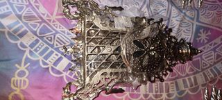 Candelabros y reloj de bronce