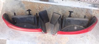 Pilotos traseros de Renault.