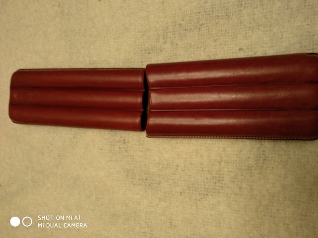 Purera de puros de cuero buena.