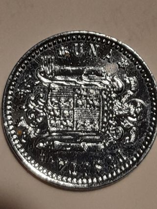 Monedas de 25 pesetas.