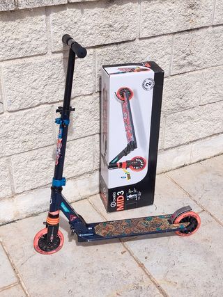 Patinete OXELO MID3 plegable.