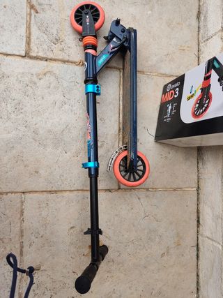 Patinete OXELO MID3 plegable.