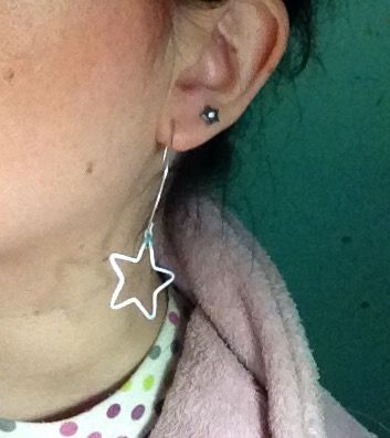 Pendientes largos plata de ley con estrella.