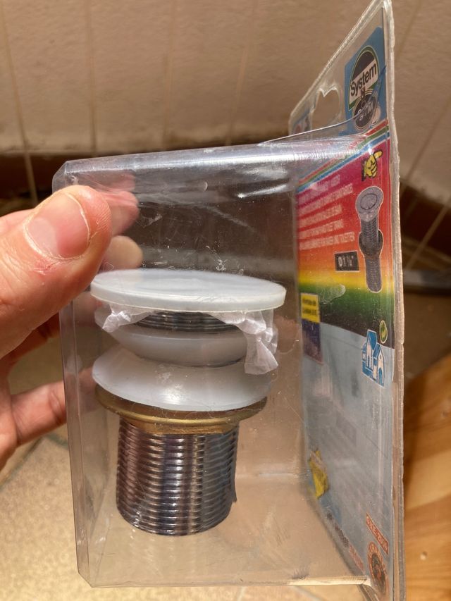 desagüe lavabo pulsador