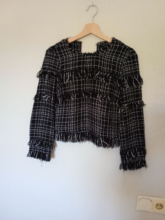 Blusa negra y blanca