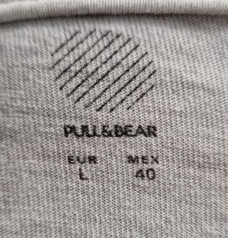 Camiseta gris tiro largo y manga corta