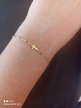 Pulseras acero cruz. Dispongo de 11 unidades 