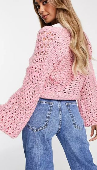 Cárdigan rosa de punto con botones perla