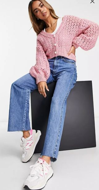 Cárdigan rosa de punto con botones perla