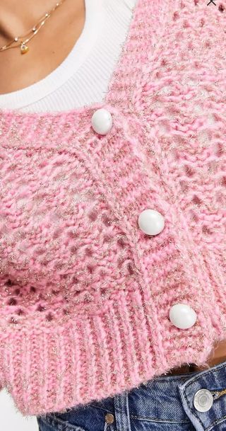 Cárdigan rosa de punto con botones perla