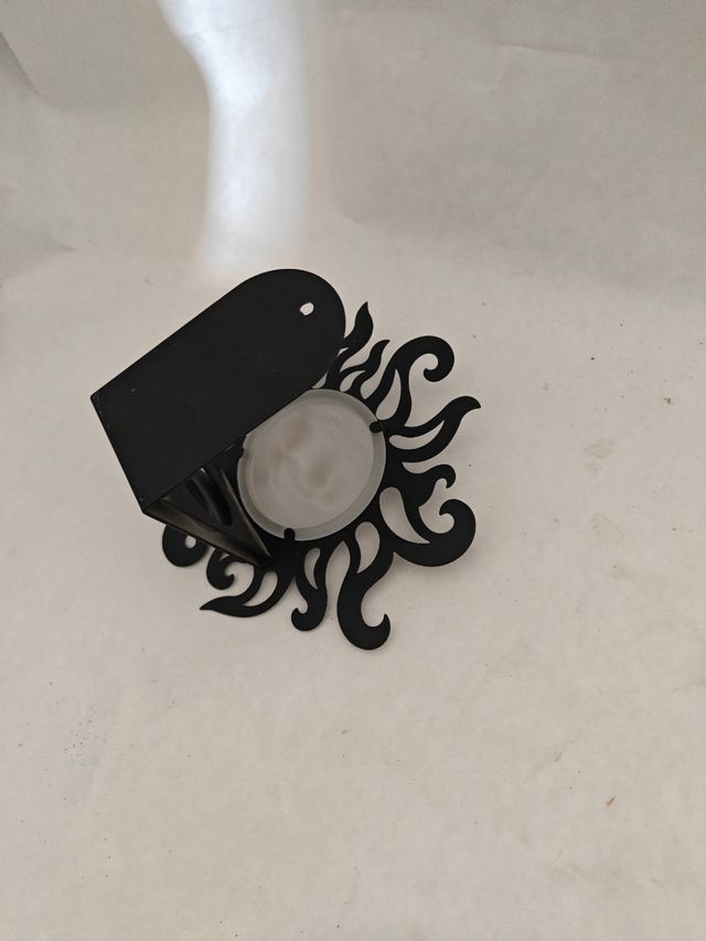 Portavelas o candelabro con cristal de aumento