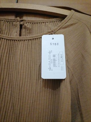 Blusa plisada media manga