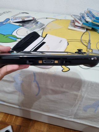 Wii U gamepad y dos juegos