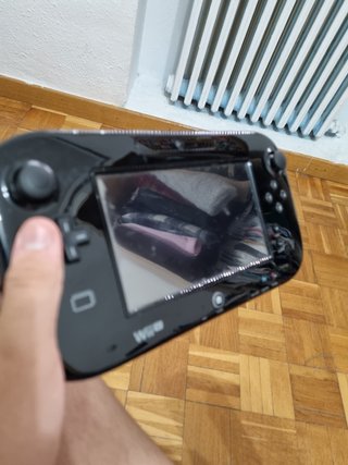 Wii U gamepad y dos juegos