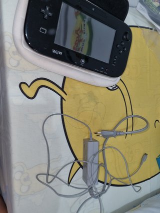Wii U gamepad y dos juegos