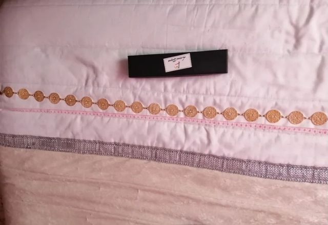 Cinturón metálico dorado