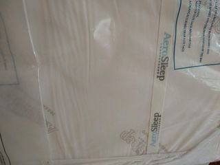 Colchon minicuna y protector antiaxfisia Aerosleep