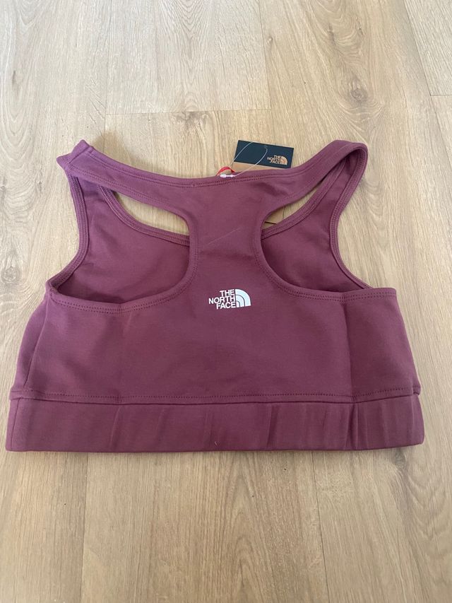 the north face top , talla L nuevo