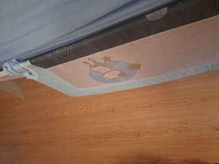 Barrera de cama abatible