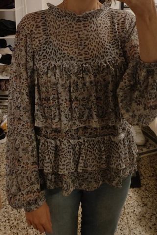 Blusa semitransparente