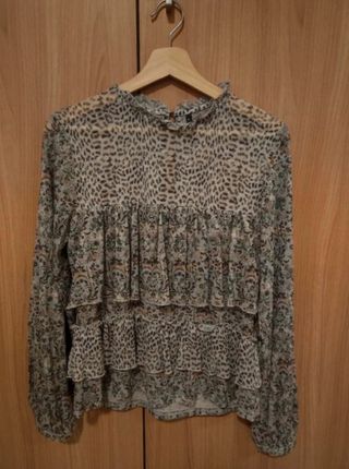 Blusa semitransparente