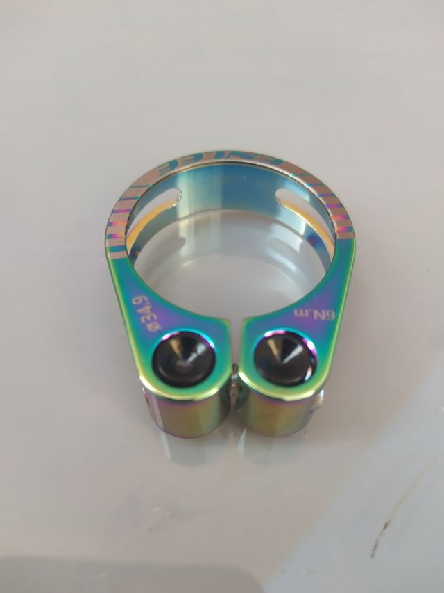 Cierre 34,9mm para tijas 31,6 y 30,9mm. Arcoiris.