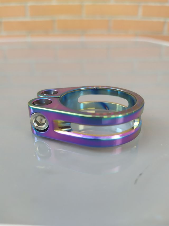 Cierre 34,9mm para tijas 31,6 y 30,9mm. Arcoiris.