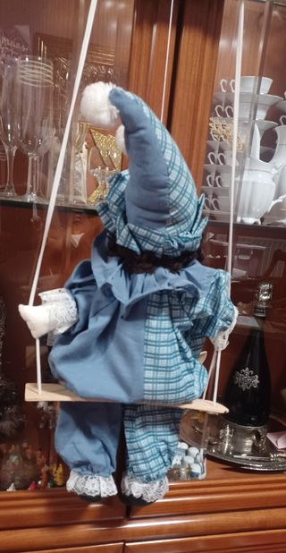 Marioneta clown columpio