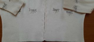 Golf cachemire bianco panna. apertura nascosta sul