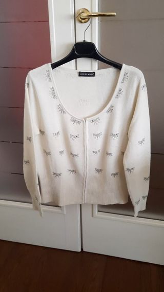 Golf cachemire bianco panna. apertura nascosta sul