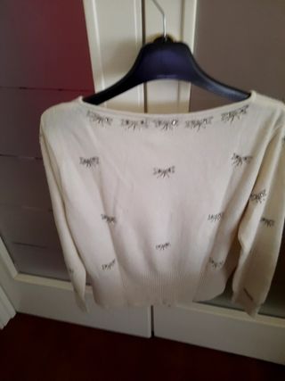 Golf cachemire bianco panna. apertura nascosta sul