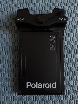 Respaldo polaroid 545