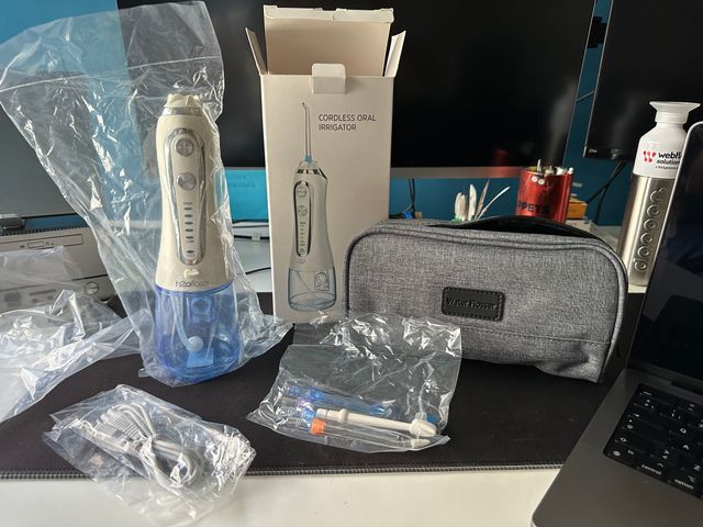 Irrigador dental de viaje