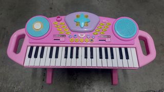 Teclado infantil con asiento