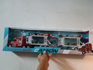 camión remolque con coches.