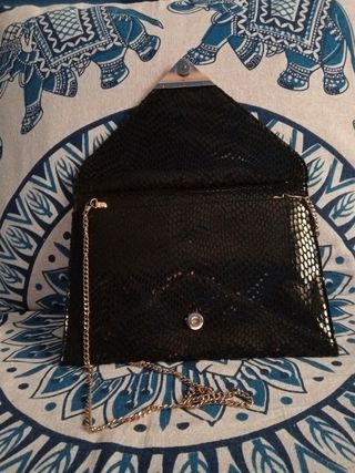 Cartera de mano efecto lentejuelas