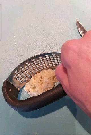 Prensa manual de ajos de acero inoxidable  4.50 €