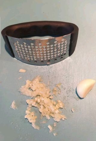 Prensa manual de ajos de acero inoxidable  4.50 €